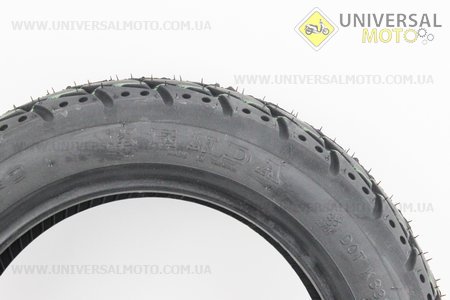 Шина 90/90-10 бескамерная, дорожная K415. KENDA (Шины / UM3037-V31)