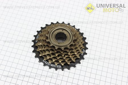 Вільнобіг 7зв. 28,24,22,20,18,16,14Т index, чорно-бронзовий MF-TZ 500. SHIMANO (Запчастини SHIMANO / UM4040-V66)