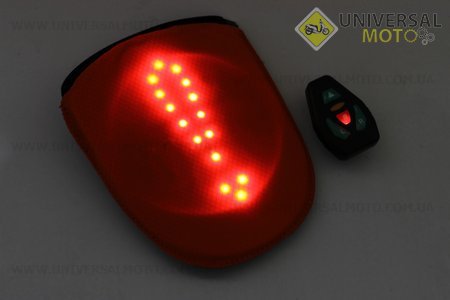 Рюкзак влагозащитный 5 литр., с диодным указателем направления, пульт дистанционного управления, Li-ion 4.2V 650mAh зарядка от USB, оранжевый. Китай (Велоэкипировка / UM4080-V16)