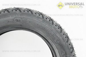 Шина 90/90-10 бескамерная, дорожная K415. KENDA (Шины / UM3037-V31)